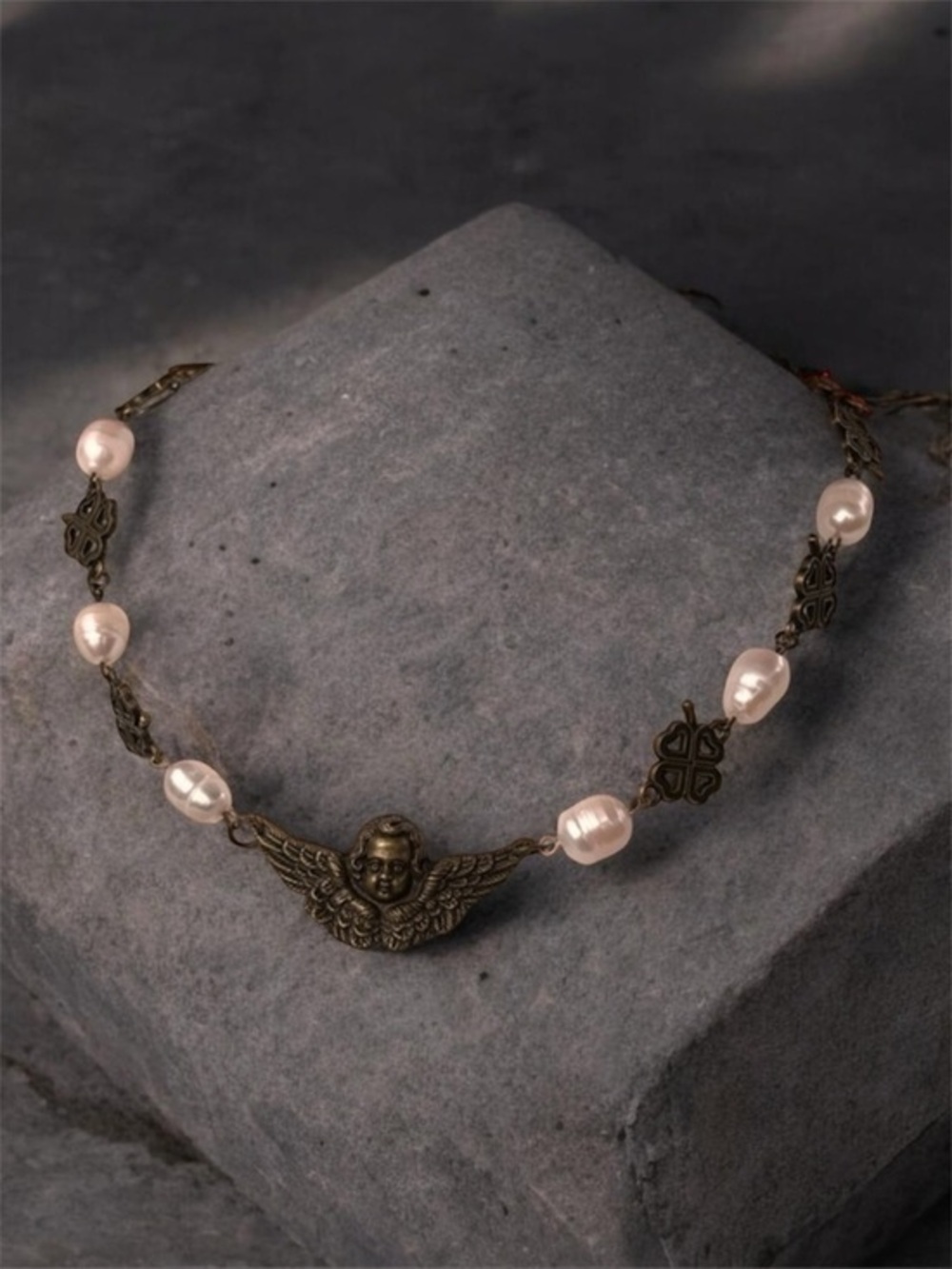 Handmade necklace. Antique gold with cherub angel and natural pearls